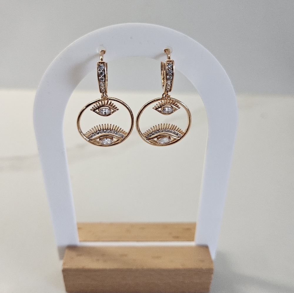 Evil eye rose gold earrings